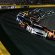 Brad Keselowski and Kyle Busch leading the field at the 2018 NASCAR All-Star race.